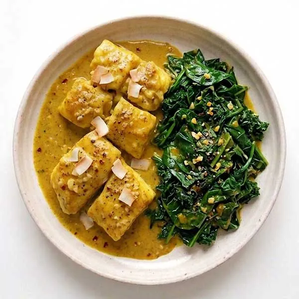 Curried Coconut Fish with Wilted Greens